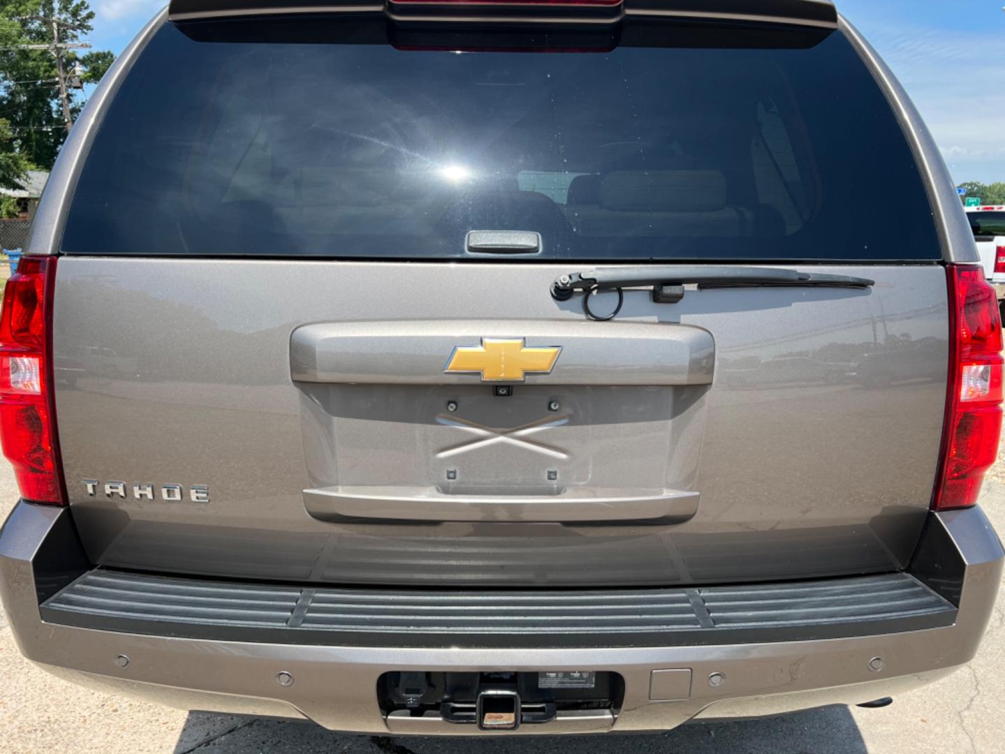 2014 Brown /Tan Chevrolet Tahoe LS (1GNSCAE04ER) with an 5.3L V8 engine, Automatic transmission, located at 4520 Airline Hwy, Baton Rouge, LA, 70805, (225) 357-1497, 30.509325, -91.145432 - 2014 Chevy Tahoe LS 5.3 V8 Gas, 147K Miles, 8 Passenger Seating, Backup Camera, Power Windows, Locks & Mirrors, Cold A/C, Tow Pkg. FOR INFO PLEASE CONTACT JEFF AT 225 357-1497 CHECK OUT OUR A+ RATING WITH THE BETTER BUSINESS BUREAU WE HAVE BEEN A FAMILY OWNED AND OPERATED BUSINESS AT THE SAME LOCA - Photo#6